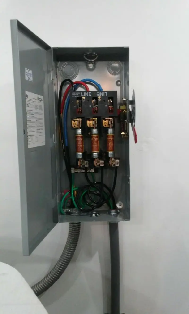 Three-phase disconnect switch installed for Smoke Detector Installation in Flagler Estates